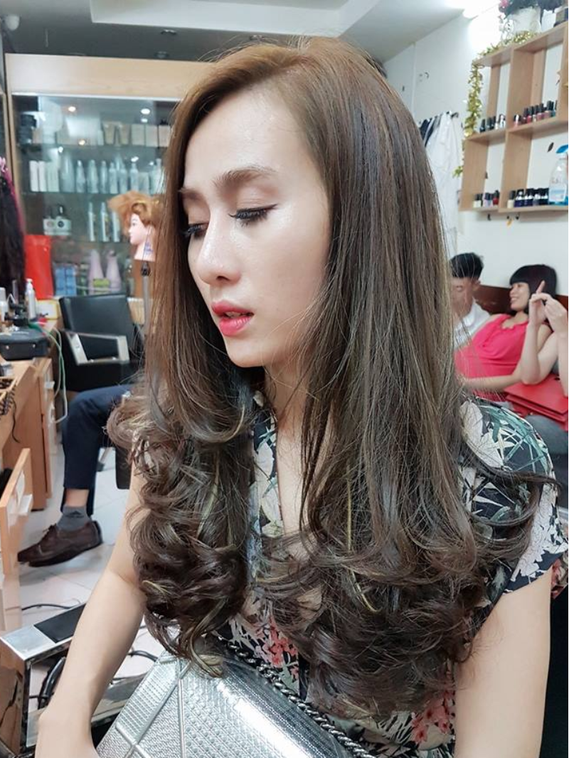 Tóc dài uốn đuôi